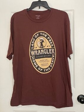 Wrangler Brown Short Sleeve Tee with Tan Oval Logo. Size XL